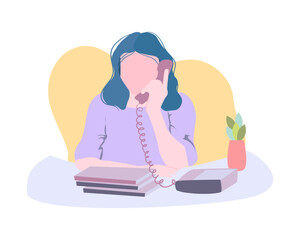 Woman on the land phone at the office