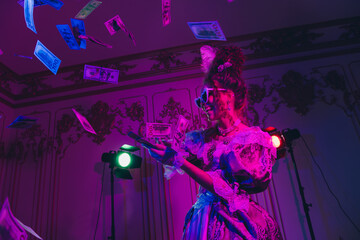 Elegant woman in baroque-inspired attire enjoying a festive celebration under vibrant lights