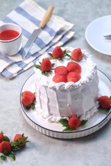 Strawberry cake, vanilla sponge cake with cream and fresh strawberries. Summer cake.
