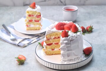 Strawberry cake, vanilla sponge cake with cream and fresh strawberries. Summer cake.
