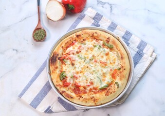pizza with sauce, sausage and paprika 