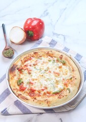 pizza with sausage, paprika and sauce 