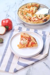 pizza with sauce, sausage and paprika 
