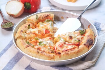 pizza with sauce, sausage and paprika 