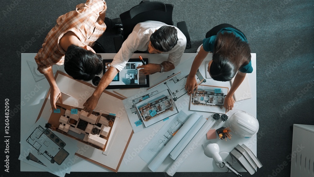 Poster top view of project manager working together to brainstorm house design while standing around meetin