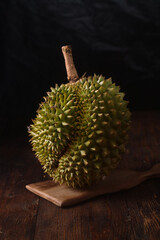Fresh Indonesian Durian, yellow and sweet. Dark Mood. Tropical of asian fruit.
