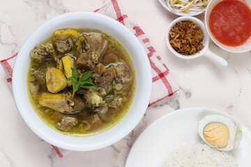 Indonesian Goat Soup: Delicious Kambing Soup with Rice and Egg