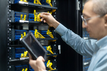 asian engineer working in database