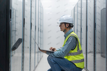 asian engineer working in database