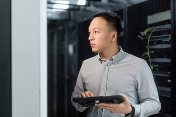 asian engineer working in database