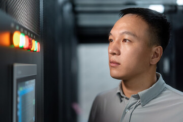 asian engineer working in database