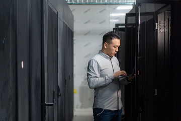 asian engineer working in database