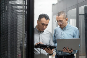 Fototapeta premium asian engineer working in database