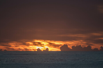 Golden sunrise, trough the clouds