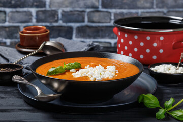 roast tomato soup in a bowl, top view