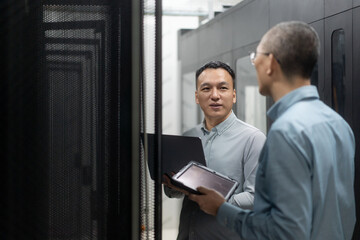 asian engineer working in database