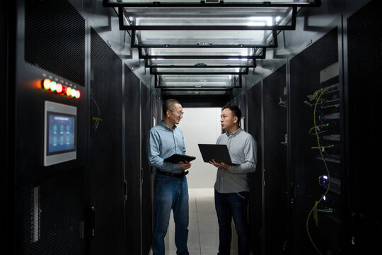 asian male engineer working in database