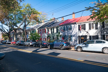 Old townhouses in the historic part of the city. Architectural monuments in the city of Alexandria, Virginia.