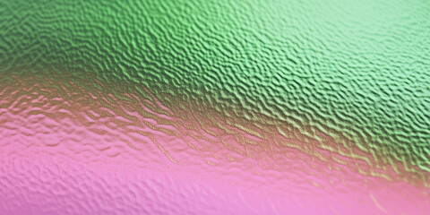 Holographic paper texture in green  and pink shades for creative design and backgrounds