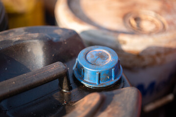 Used engine oil or hydraulic motor oil gallon that keep at the chemical store area. Industrial...