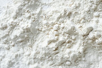 Obraz premium Image of White fine flour powder macro texture. Professional photo for food blog