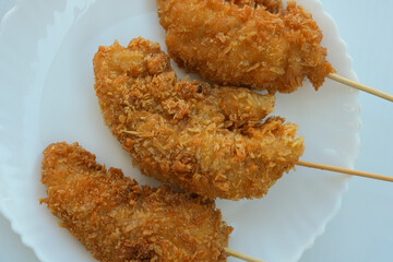 Fried food that Thai people like to eat is chicken breast coated in flour and bread and fried.