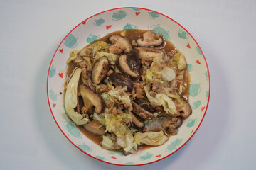 Stir-fried cabbage with mushrooms is a dish that Thai people like to make and eat regularly.