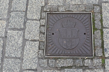 manhole cover in the street