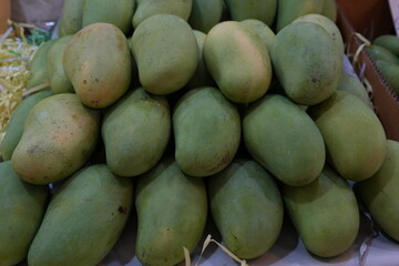 There are many kinds of fruit in Thailand. The one that Thai people like to eat is called unripe mango.