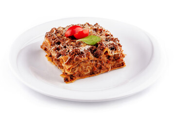 Portion of lasagna sitting on a white plate
