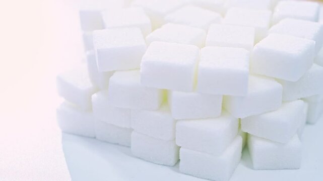 High angle view rotation of sugar lumpy close-up