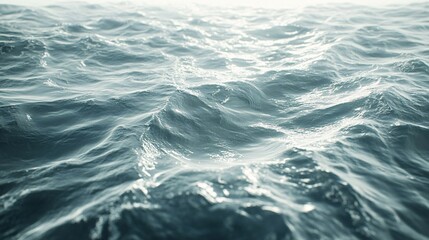 Fototapeta premium A tranquil scene of gentle ocean waves rippling across the water’s surface, illuminated by soft, diffused light, creating a peaceful atmosphere.