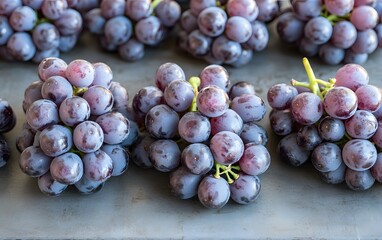 Closeup of Juicy Red Grapes on Gray Surface