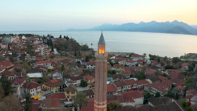 An impressive drone shot that circles around the Yivli Minaret in Antalya Kalei&ccedil;i and then switches to a wide angle. The historical architecture, the Mediterranean view and the Taurus Mountains combin