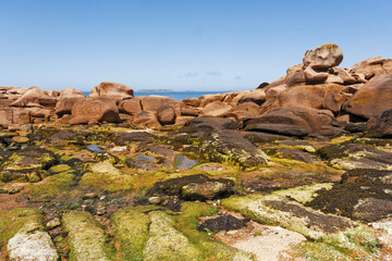 rocks and boulders on The Pink Granite Coast  a stunning stretch of coastline located in northern...
