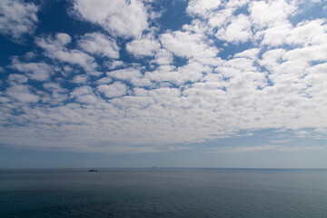 Fototapeta premium tranquil seascape with clouds and sea