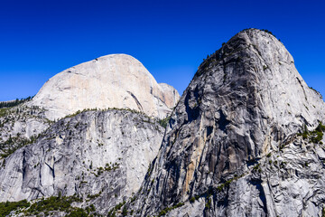 Scenic view of  Liberty Cap, with Half Dome behind it, from Clark Point in Yosemite National Park.