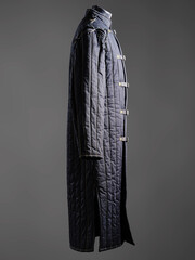 Historical fashion. Medieval knight cloth. Padded jacket gambeson.