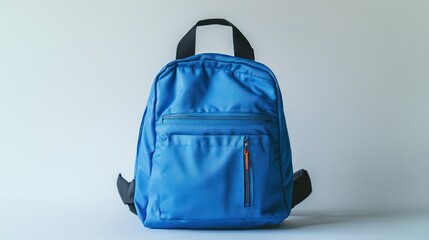Bright Blue Backpack Against Light Gray Background