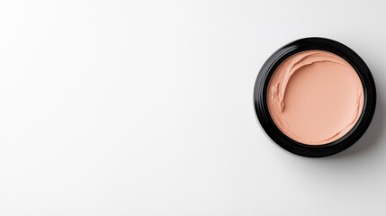 Peach-toned cream jar on white background, beauty product