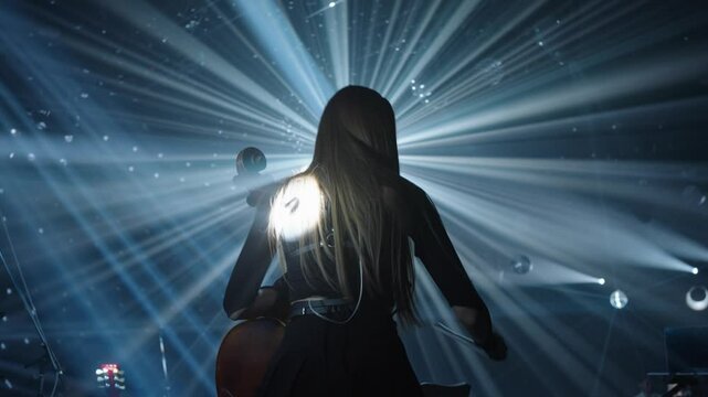 Cello on stage with concert lighting