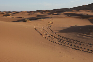 Sand hills, waves and footprints in the sand, Sahara dunes, Morocco