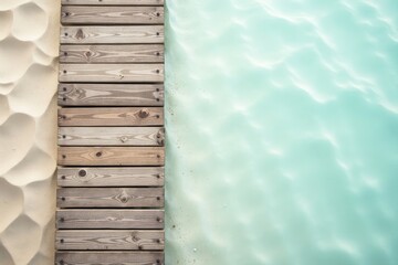 Serene Coastal Scene Wooden Walkway Meets Tranquil Aqua Water and Soft Sand