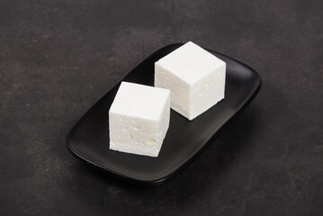 sugar cubes on black background