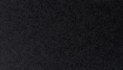 Dark textured backdrop creates dramatic effect for artistic displays and designs