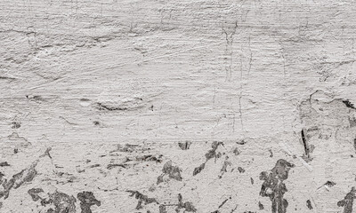 Cement background painted white with cracks and scuffs.