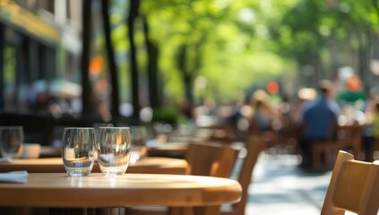 Sunny Day Outdoor Cafe: Empty Glasses on a Wooden Table