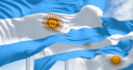 Argentina national flags waving on a clear day