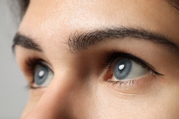 Closeup view of woman with blue eyes