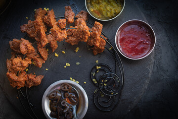 Seitan barbecue kebab on black background